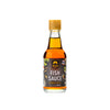 Bottle of SIAM fish sauce with a gold cap on a white background
