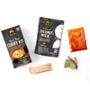 Assorted food packages including a red Thai curry kit, coconut milk, and other ingredients on a white background.